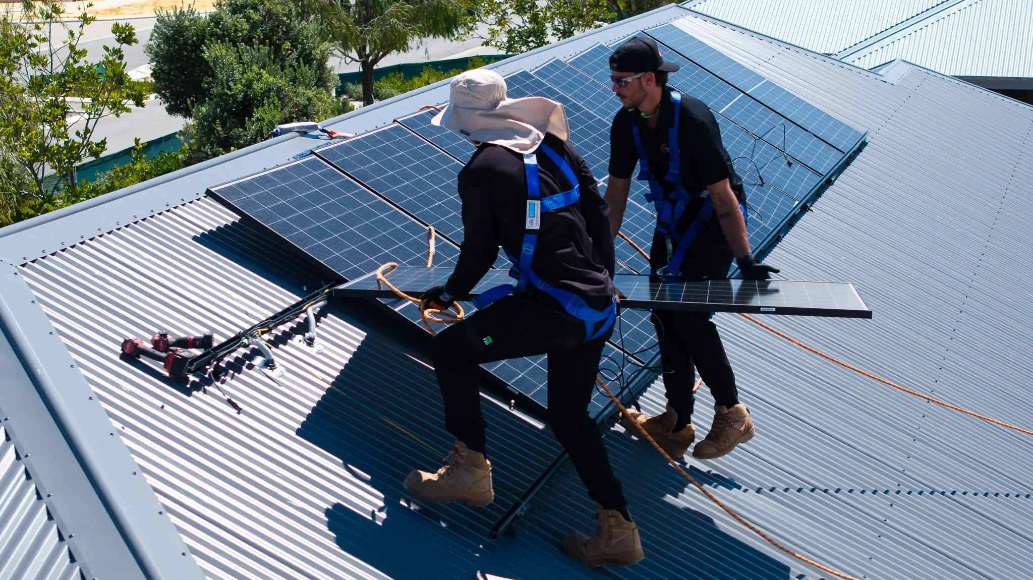 DMG team working on a solar installation DMG team working on a solar installation