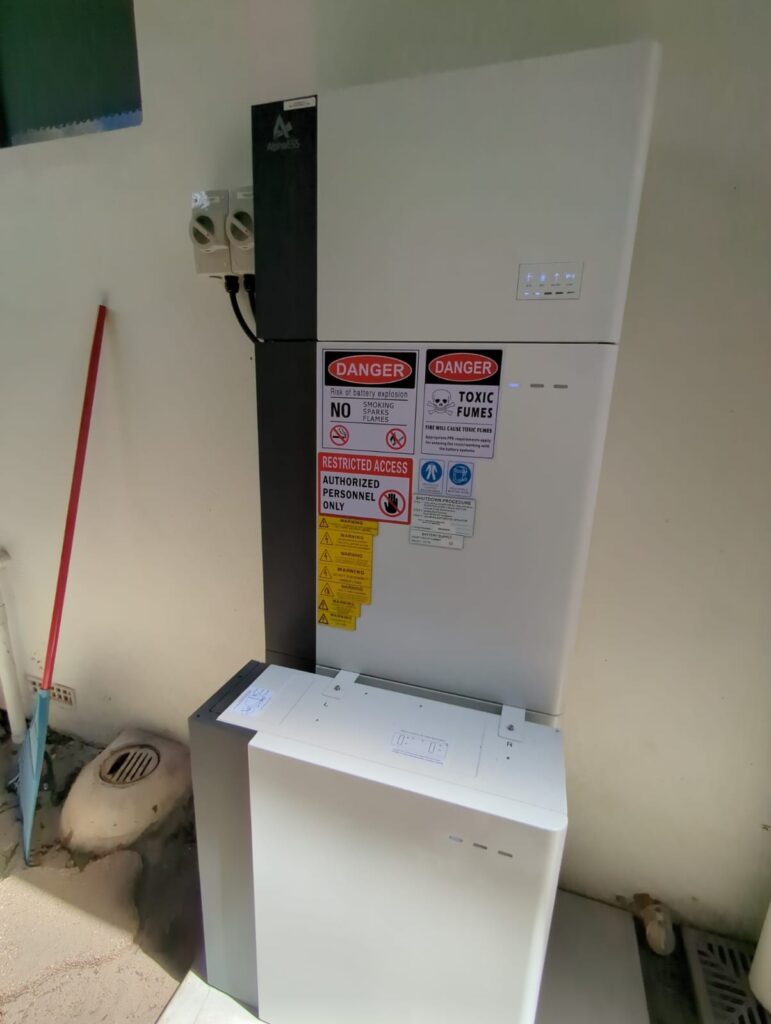 AlphaESS inverter and battery stack indoors at Daglish
