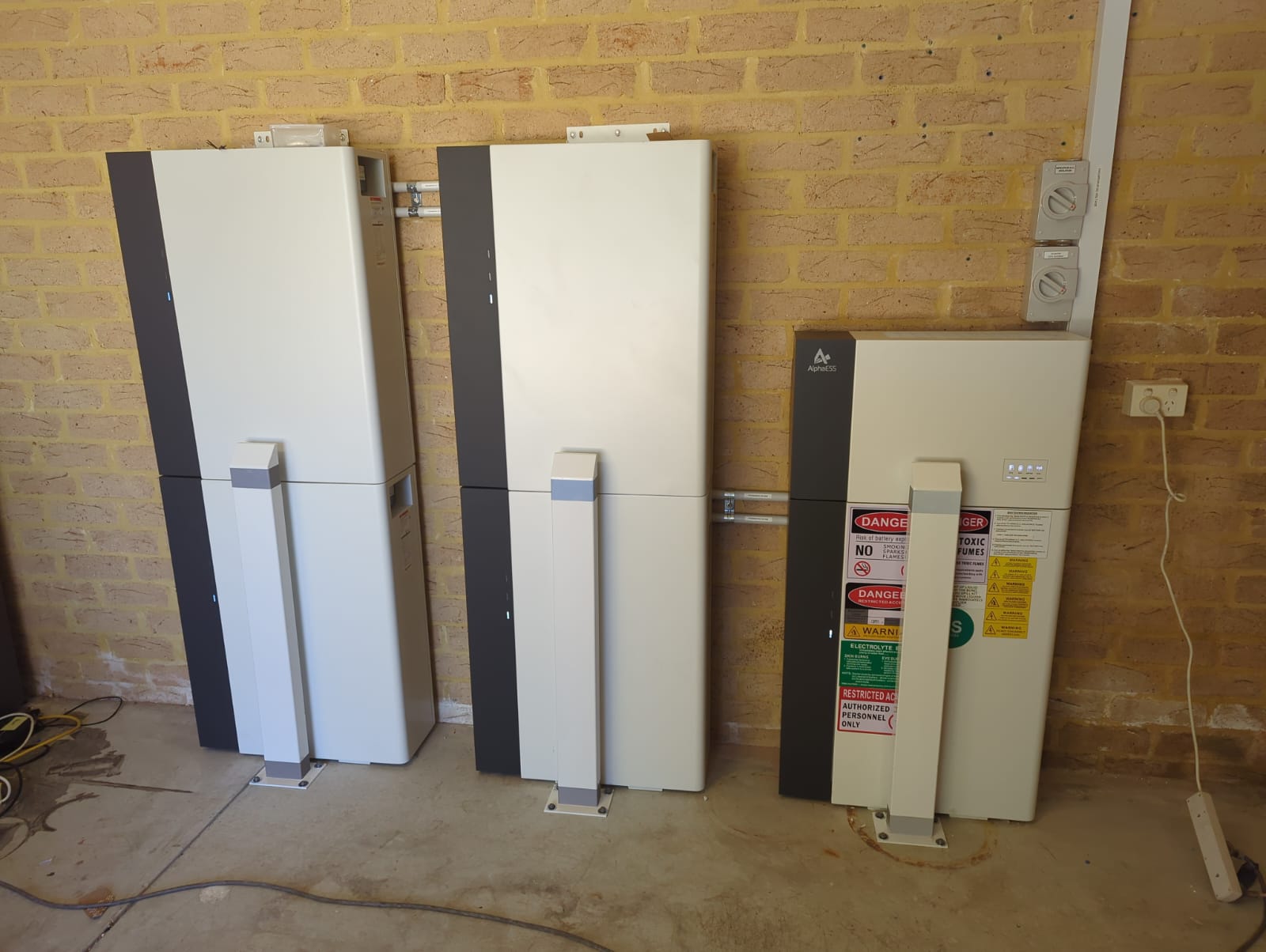 AlphaESS battery stack and inverter installed in a Gwelup garage