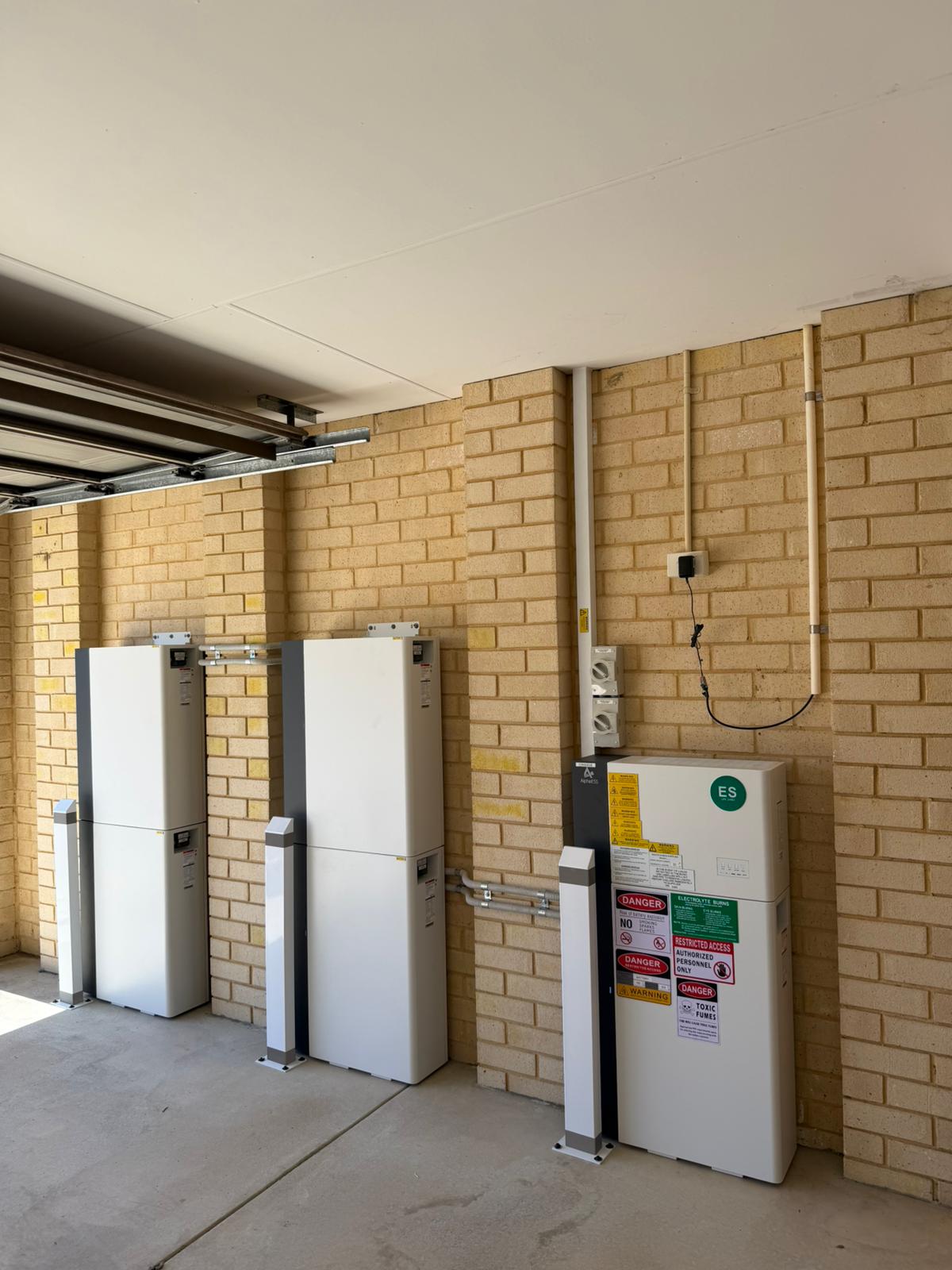AlphaESS battery towers and inverter cabinet installed at Harrisdale