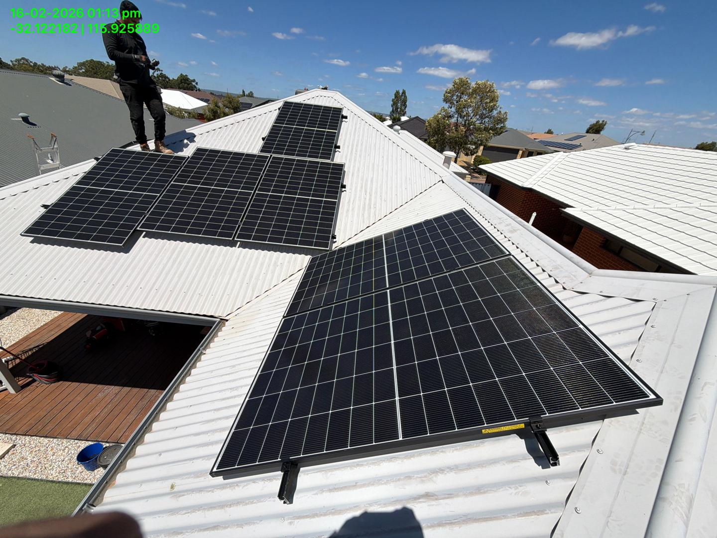 Solar panels installed across the metal roof at Harrisdale