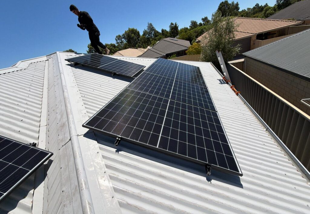 Tilted solar panel section being installed at Harrisdale