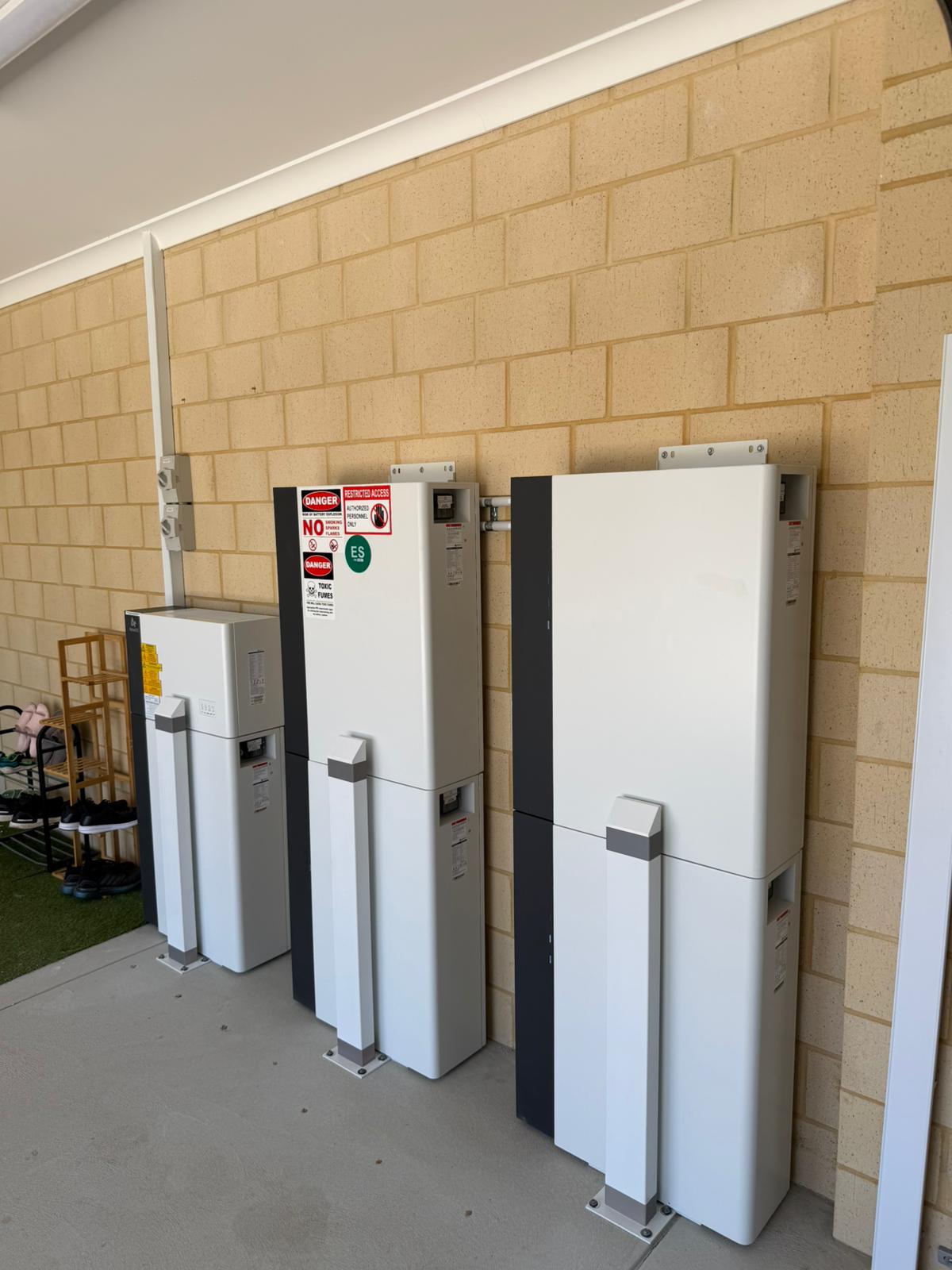 AlphaESS battery cabinets and inverter installed in a Hilbert garage