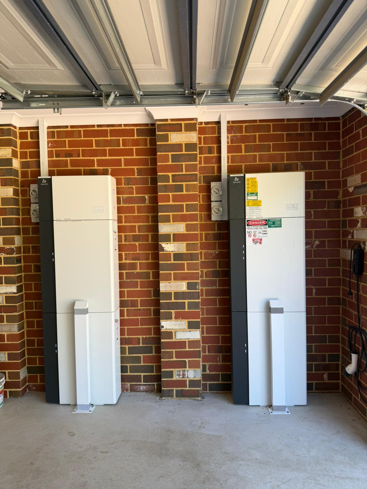 Twin AlphaESS inverter and battery setup installed in Hilbert garage