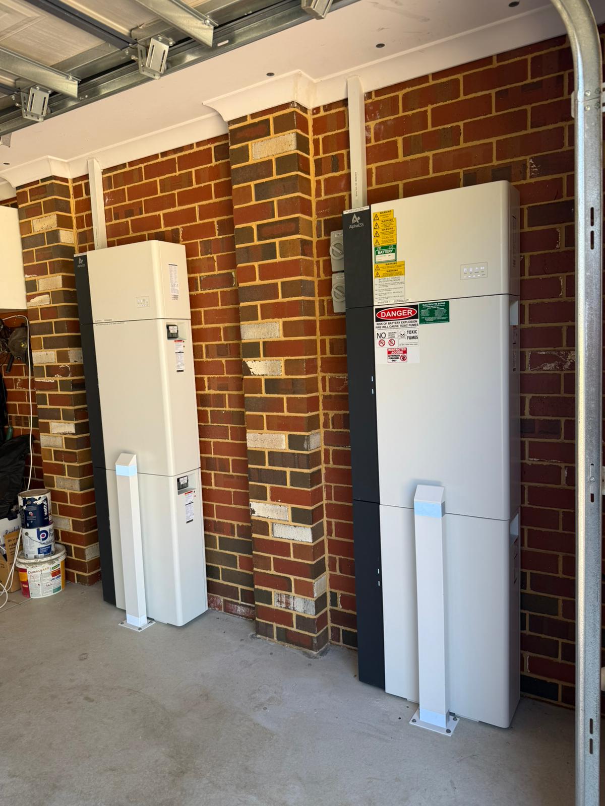 Side view of the AlphaESS twin inverter and battery cabinet