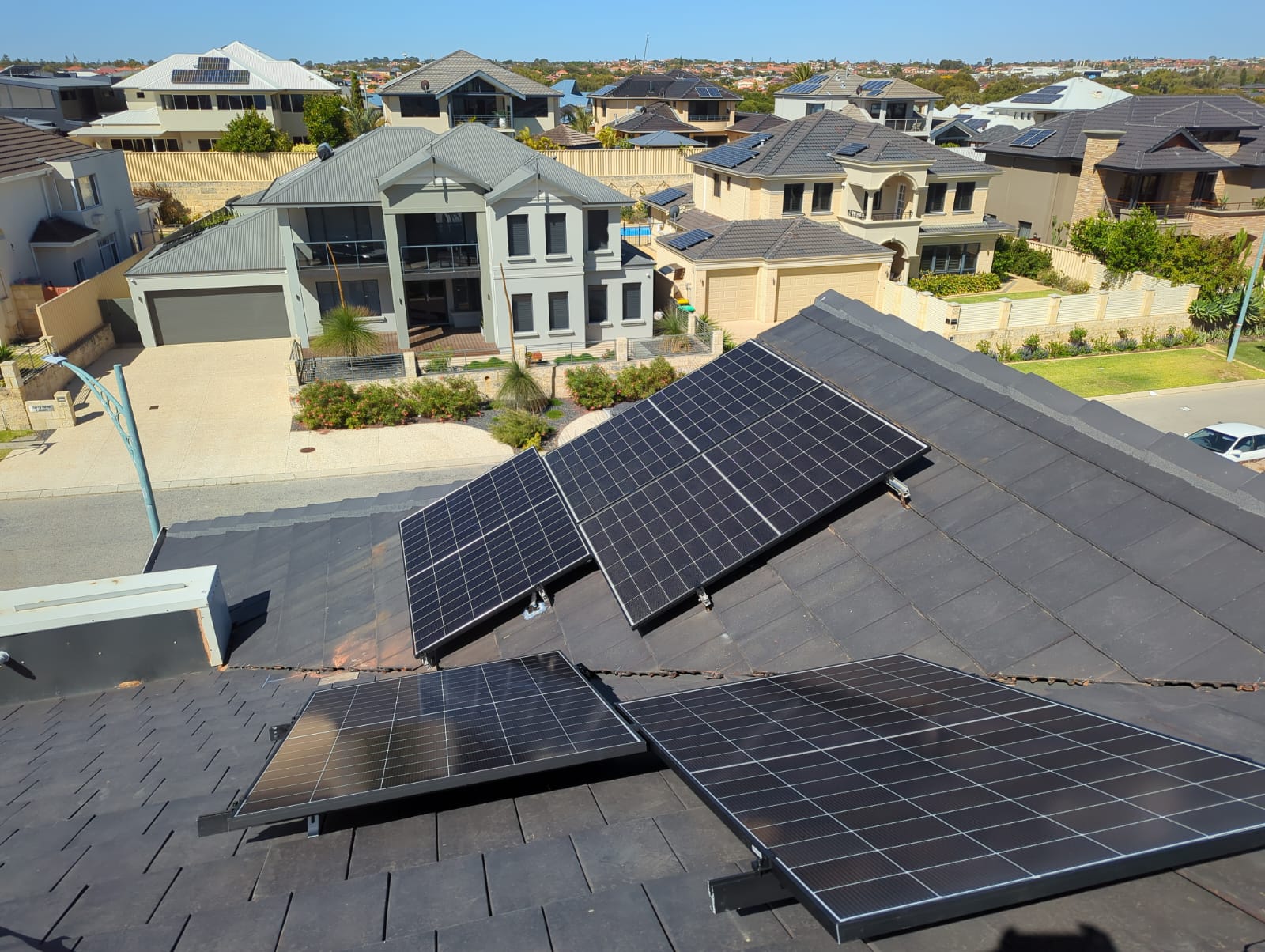 Solar panels installed on a tiled Iluka roof