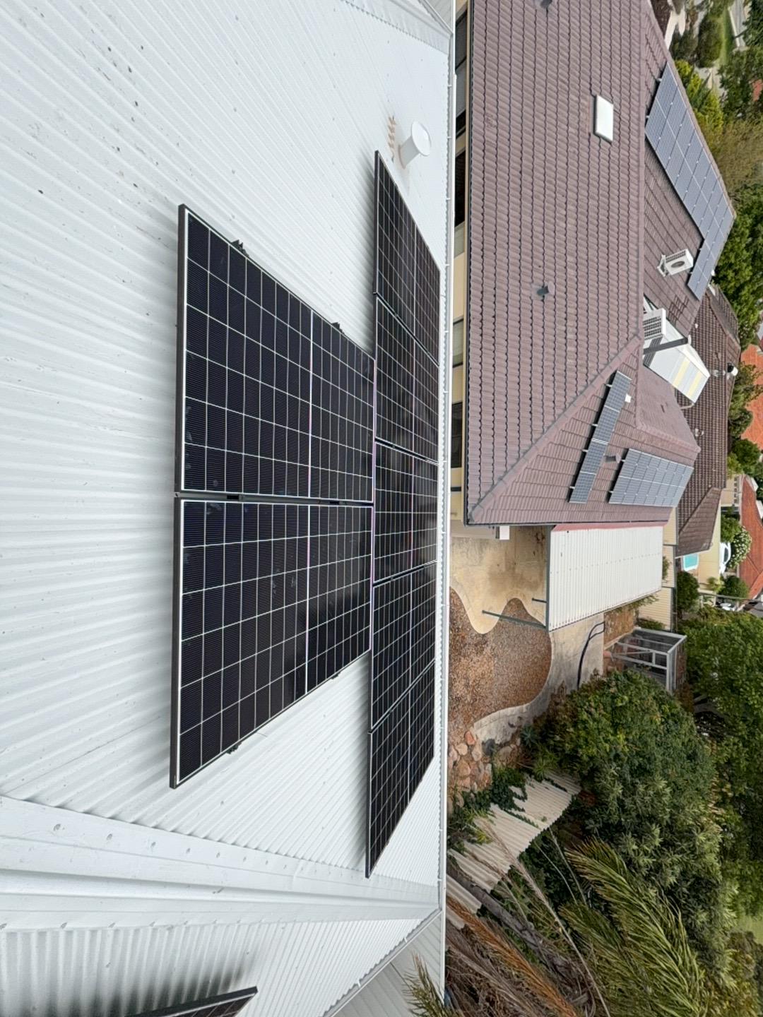 Solar array mounted on a tin roof in Leeming