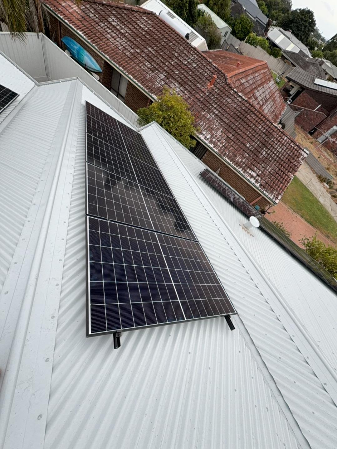 Wide view of AlphaESS battery storage in a Leeming garage