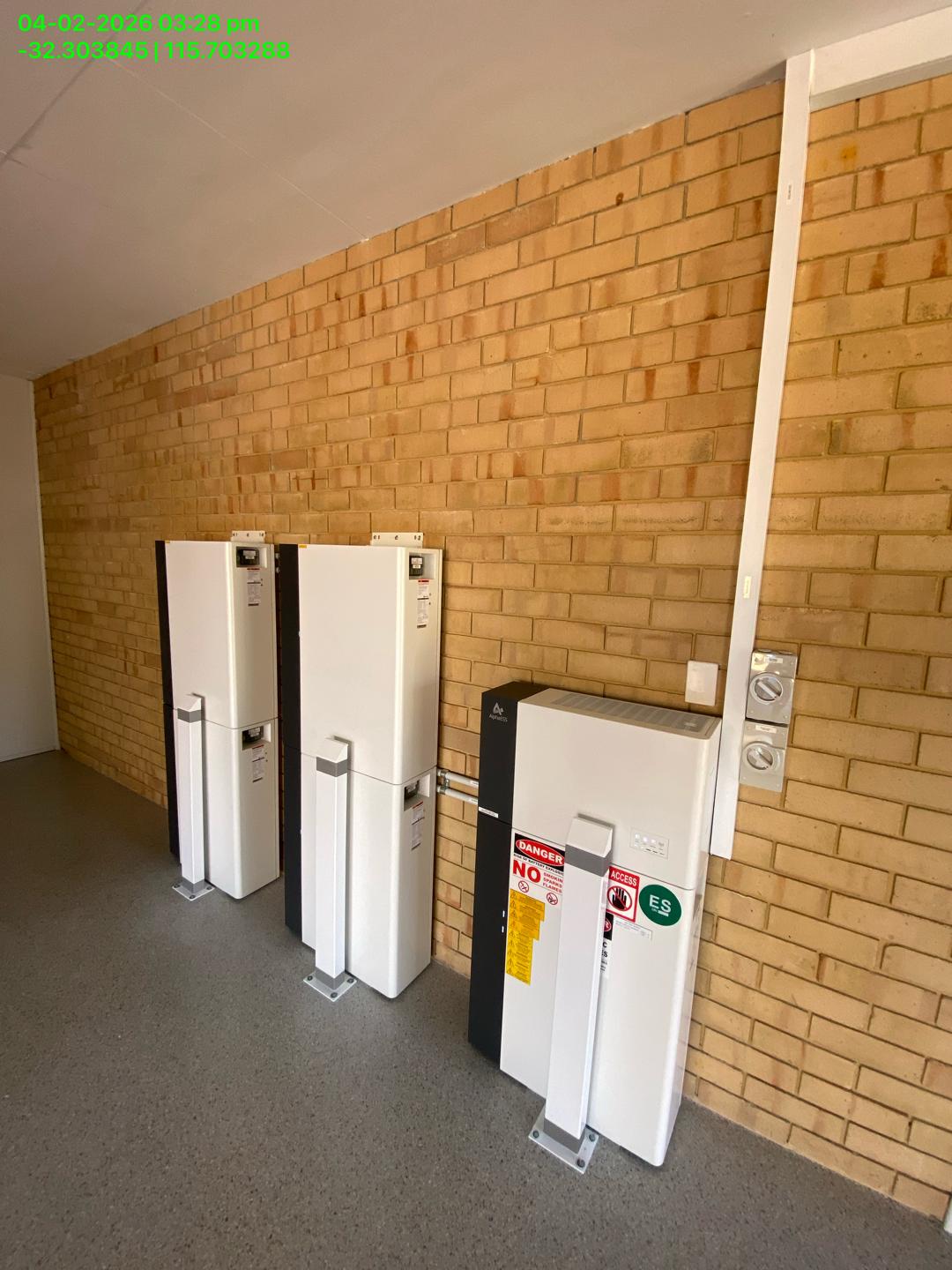 AlphaESS battery storage installed beside switchboard