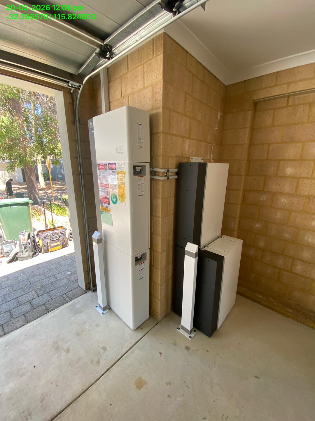 AlphaESS battery and inverter with bollards in Wellard garage