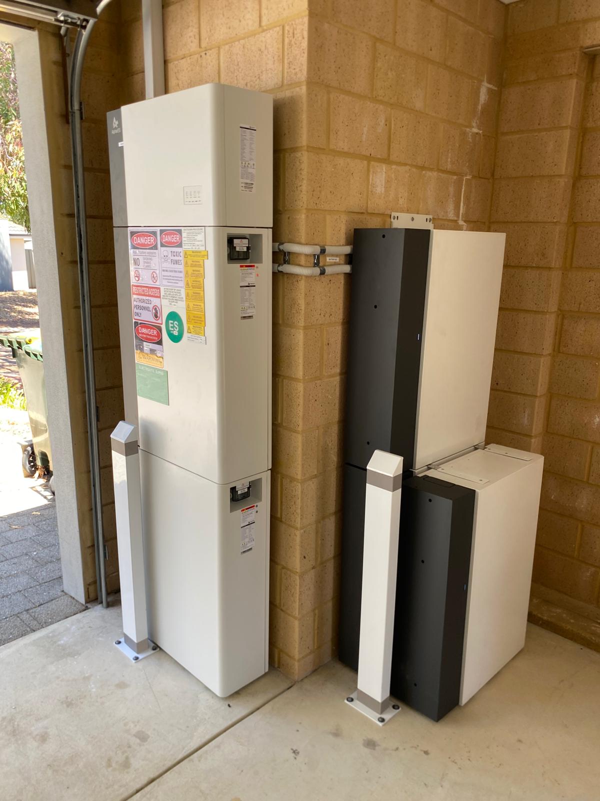 AlphaESS battery cabinets stacked in a Wellard garage