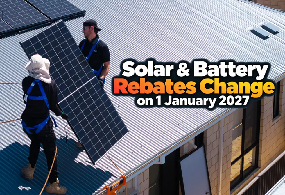 DMG Solar installers carrying a solar panel across a Perth roof, with text reading Solar and Battery Rebates Change on 1 January 2027