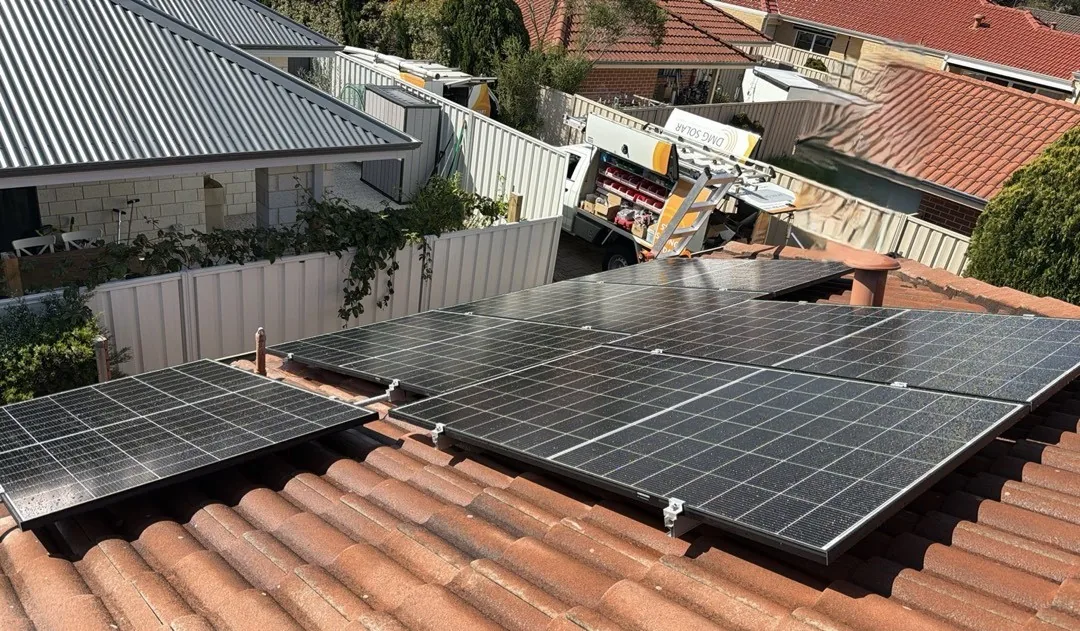 Trina solar panels in groups on a terracotta tiled roof in Brentwood