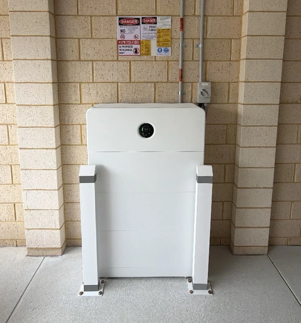 GoodWe ESA 24.96kWh battery with isolator and two bollards in a garage