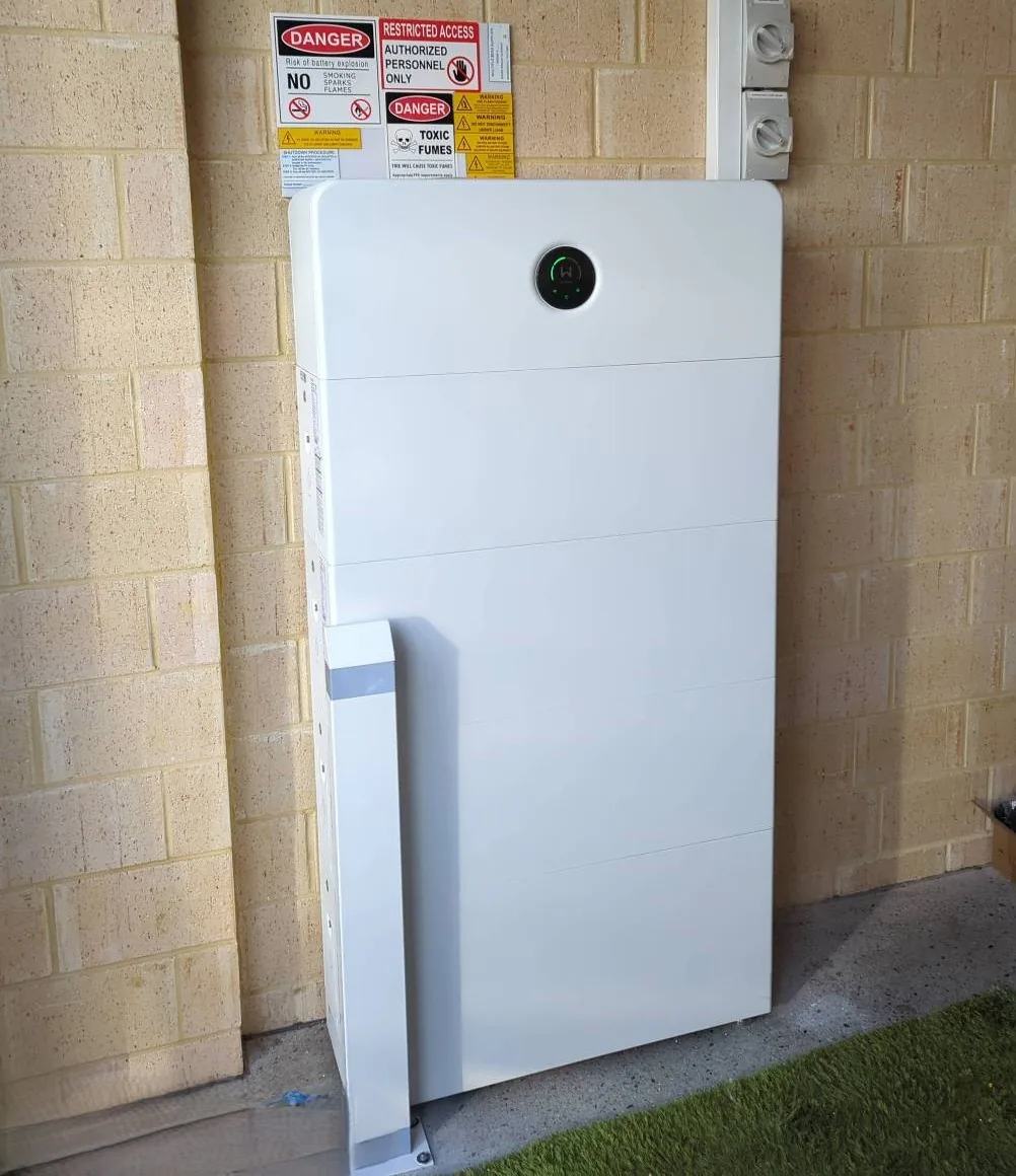 GoodWe ESA 33.28kWh battery mounted on an outside brick wall in Madeley
