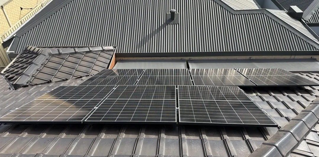 Trina solar panels on a dark concrete tiled roof in Nollamara
