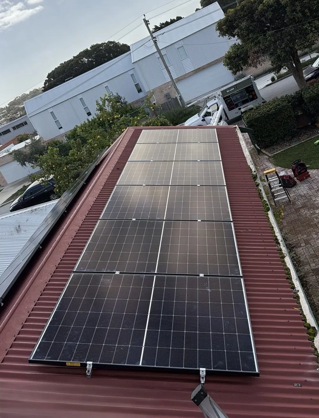 Rows of WINAICO panels two abreast on a red Colorbond roof
