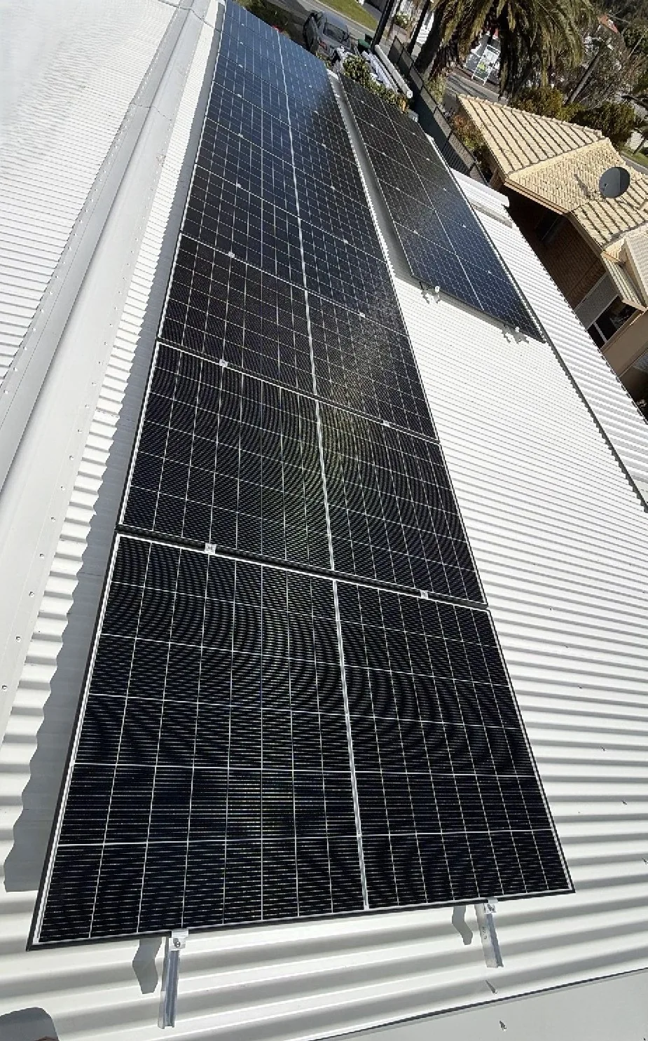 Long run of Trina Vertex S+ solar panels along a Colorbond roof