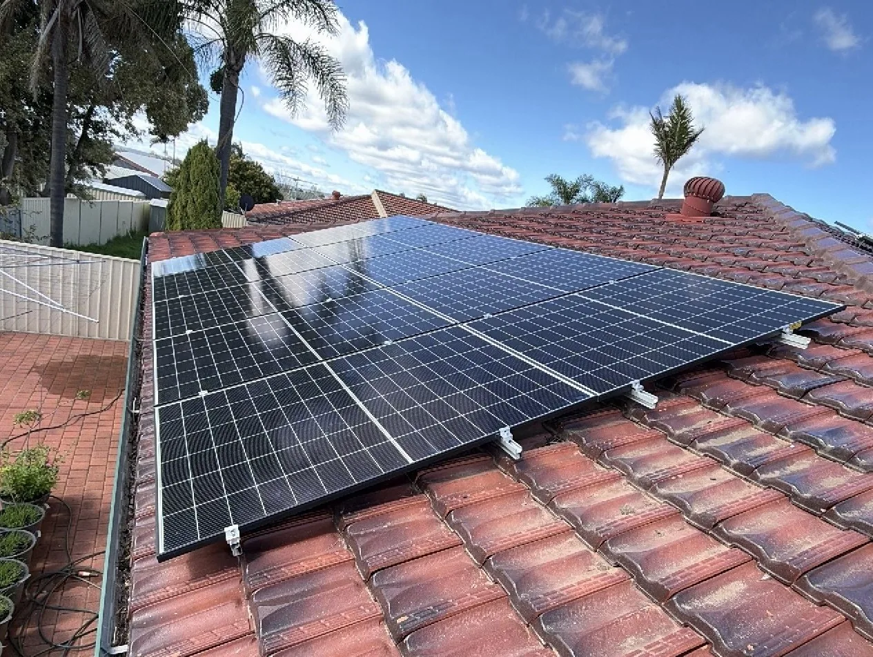 Trina solar panels on a terracotta tiled roof in Thornlie