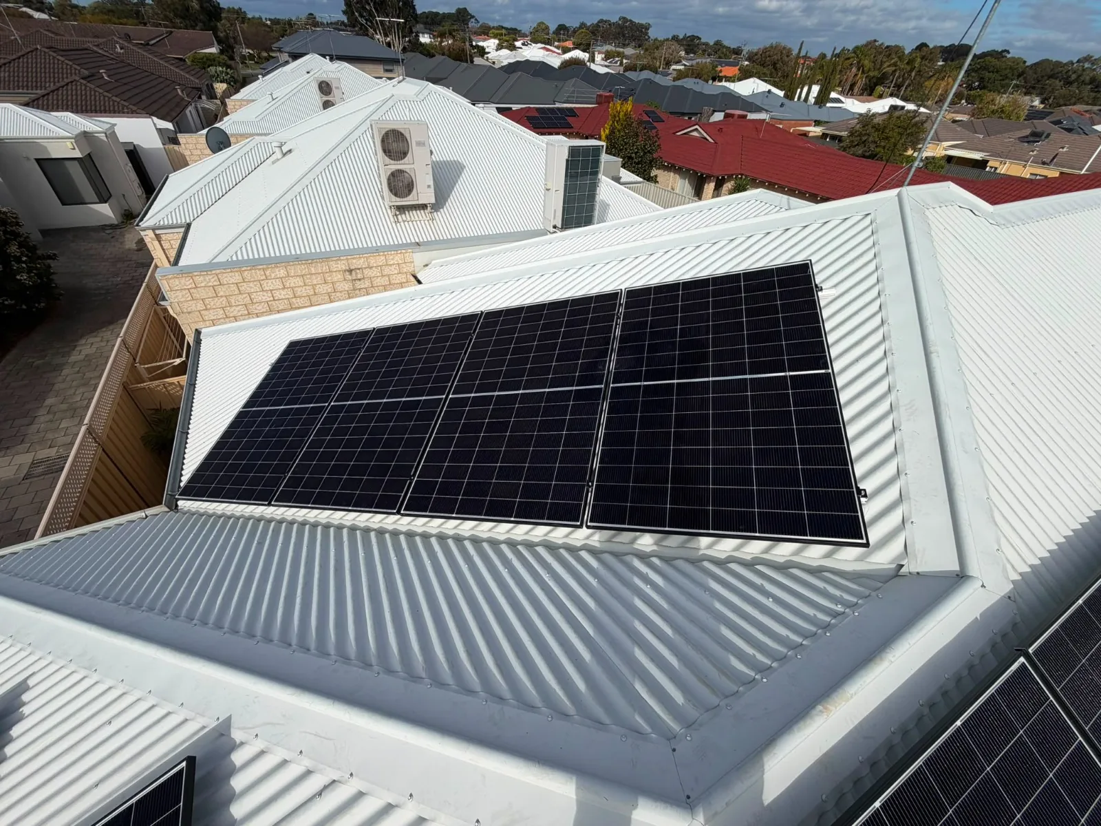Trina solar panels on a light Colorbond roof in Westminster