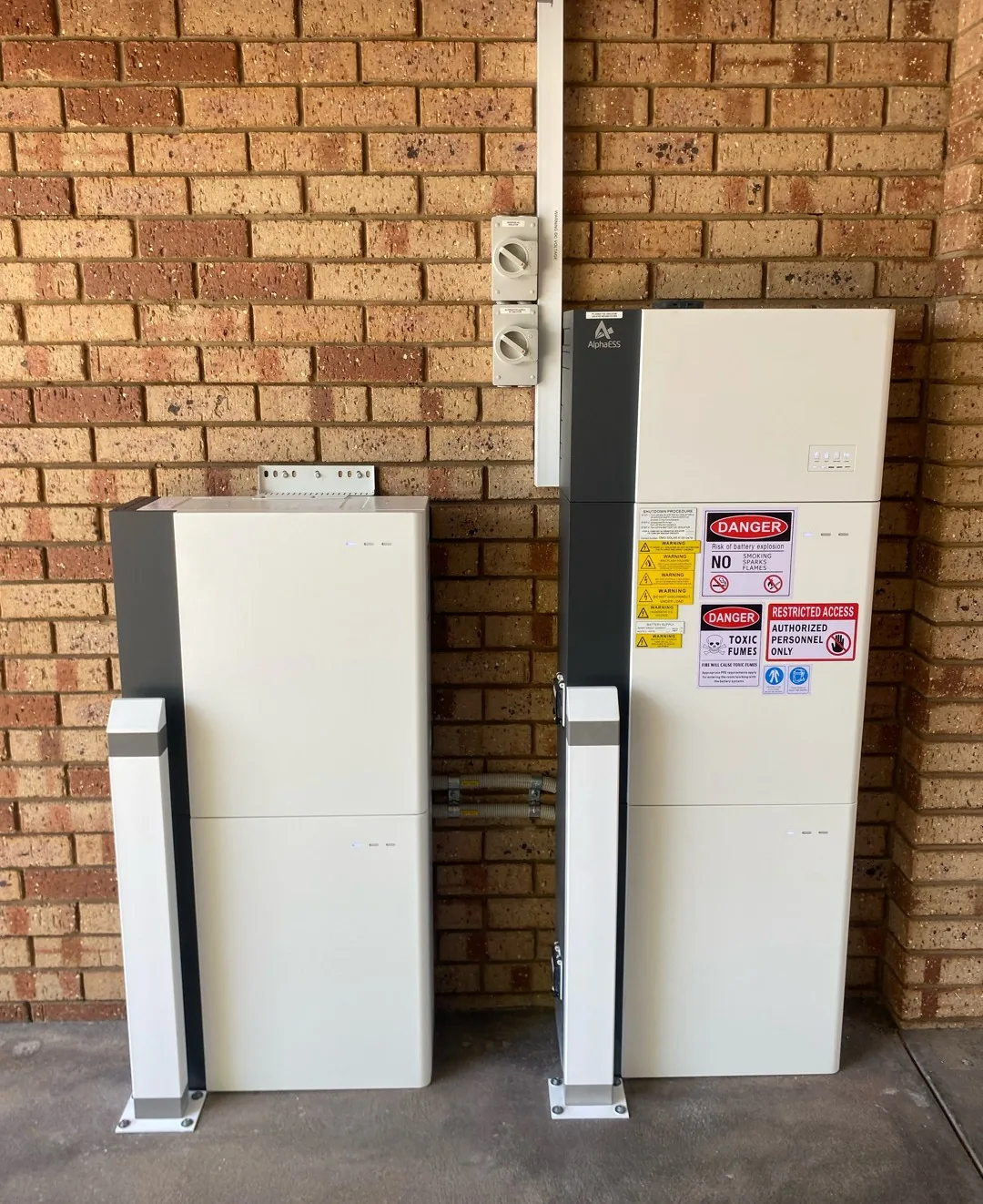 AlphaESS SMILE-G3 37.2kWh battery in two cabinets against a brick wall